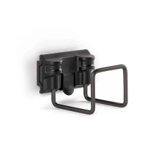 Svart universalh�llare fr�n Toolflex One monterad p� v�gg, avsedd f�r upph�ngning av redskap, slangar eller sladdar